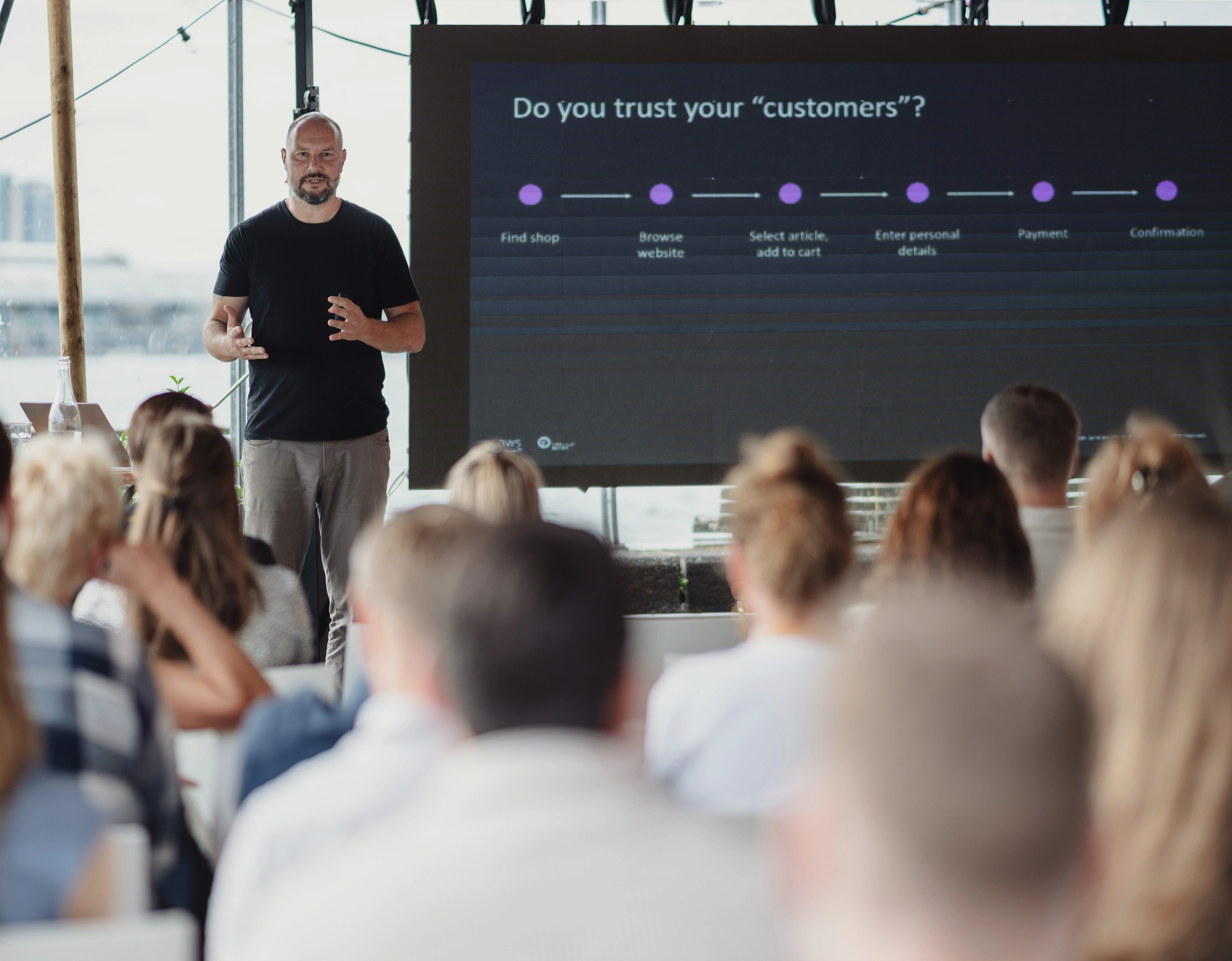 Alexander Günsche from AWS on stage in Amsterdam.