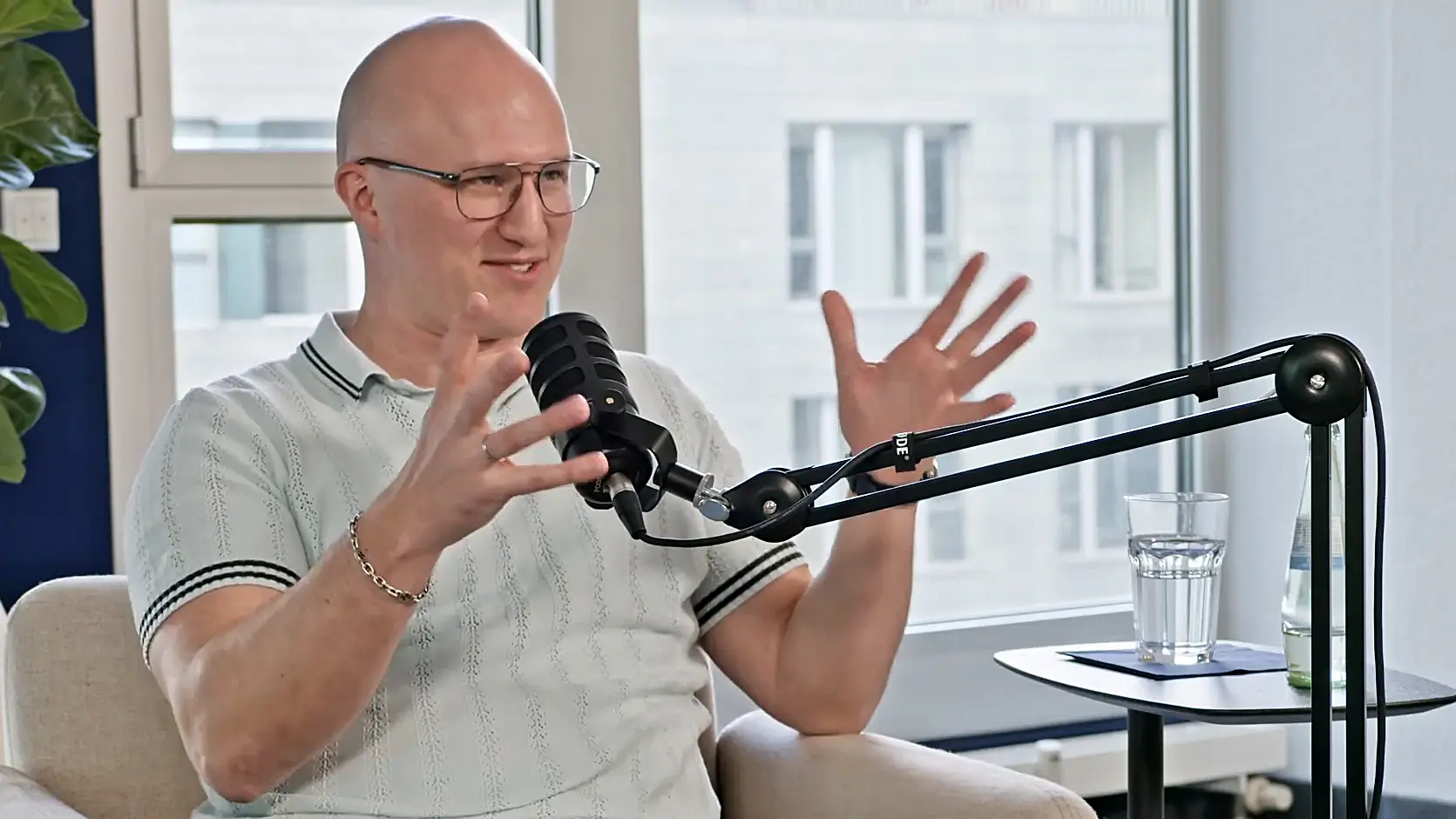 Roman Philippi speaking in a podcast studio